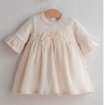 Creme_jurkje_met_een_strik_lavikids