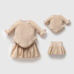 Beige_gebreide_babyjurk_setje_lavikids